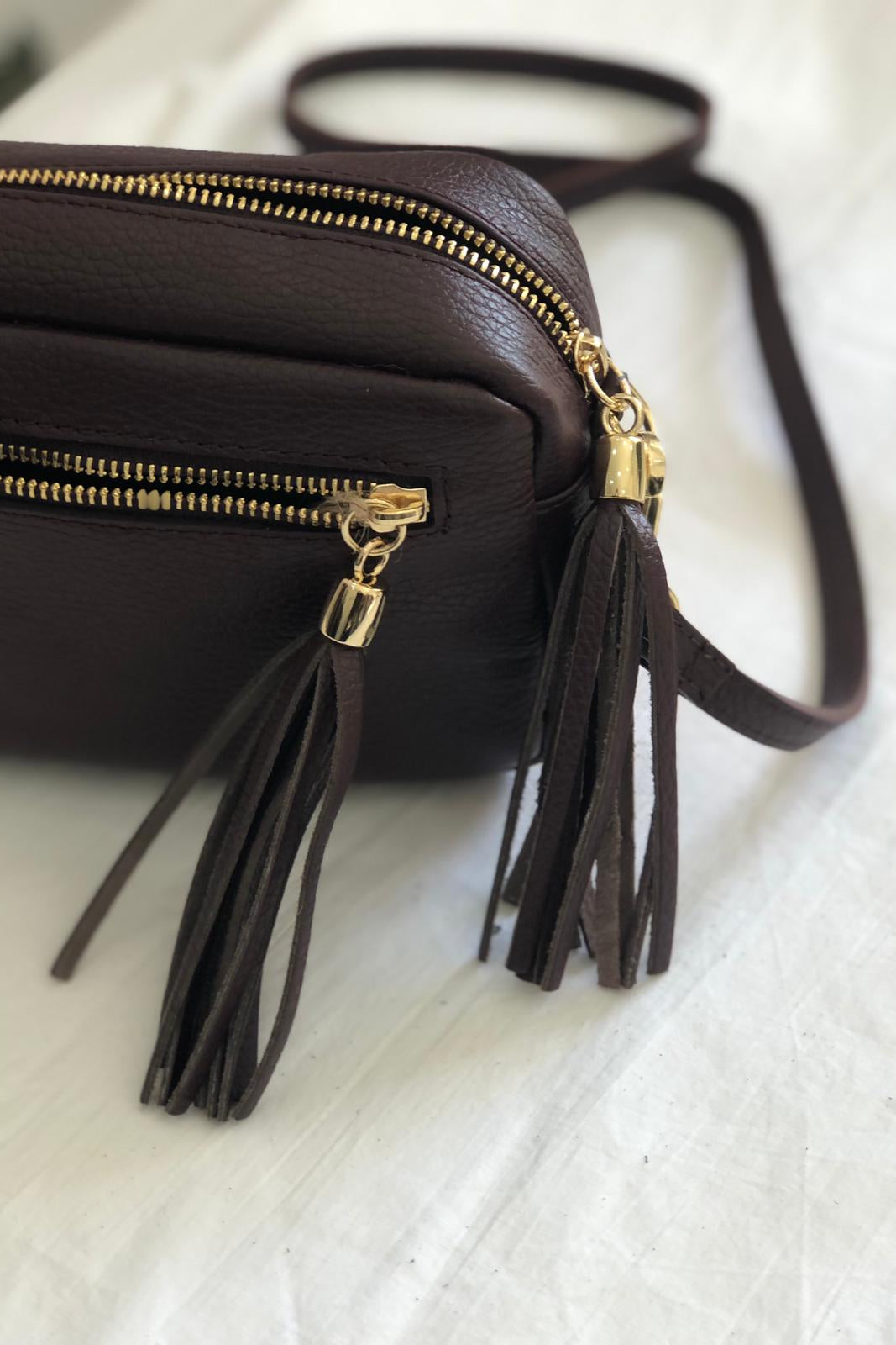 Crossbody Twist in pelle