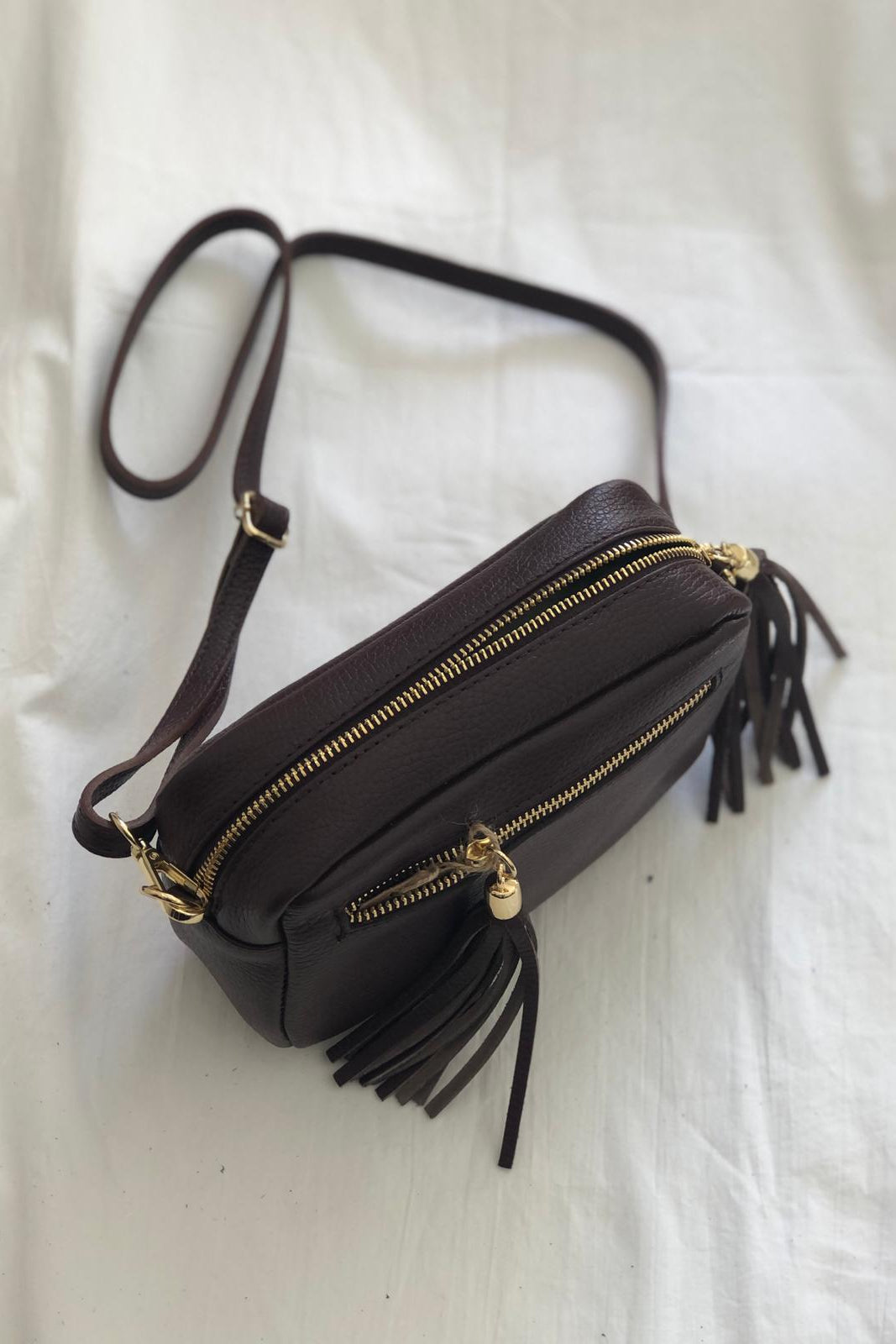 Crossbody Twist in pelle
