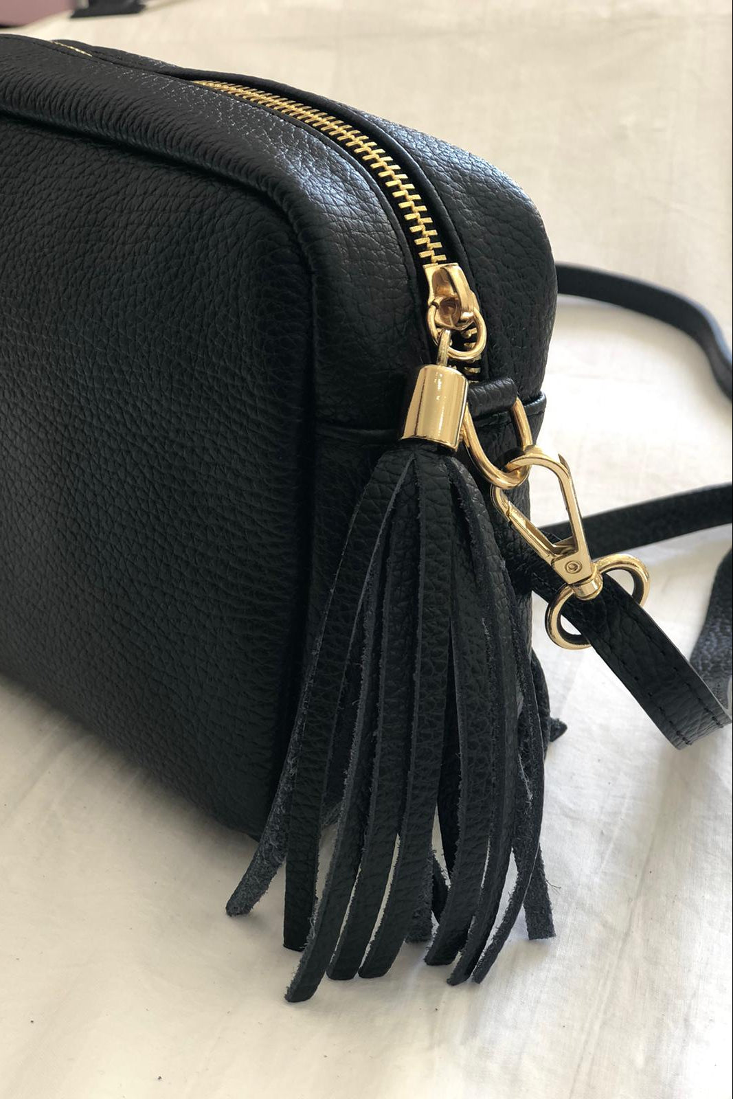 Crossbody Twist in pelle