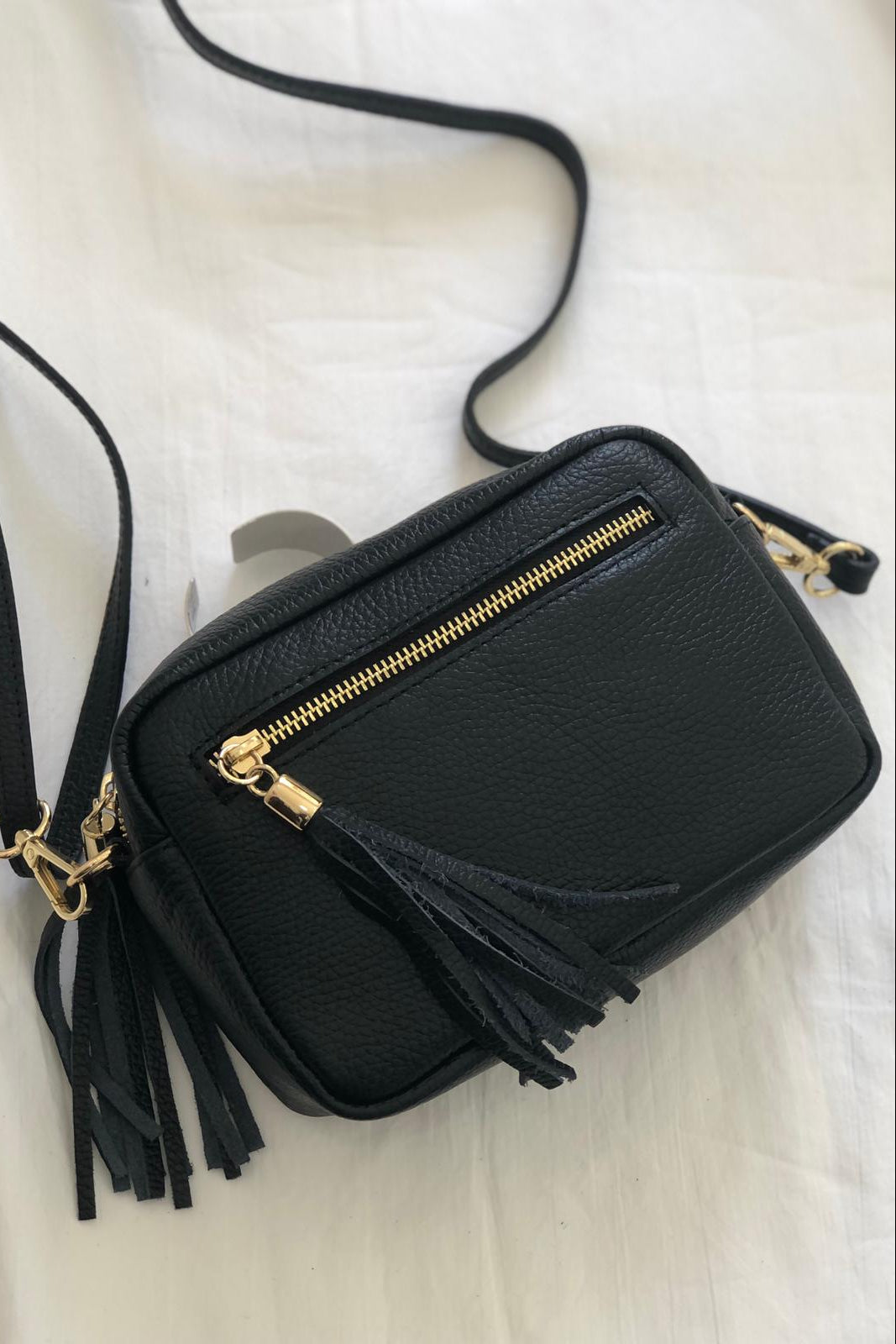 Crossbody Twist in pelle