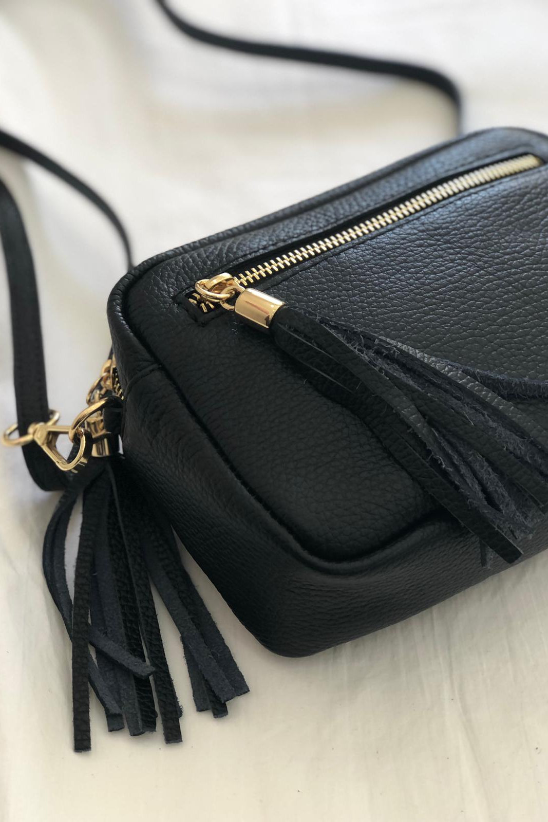Crossbody Twist in pelle
